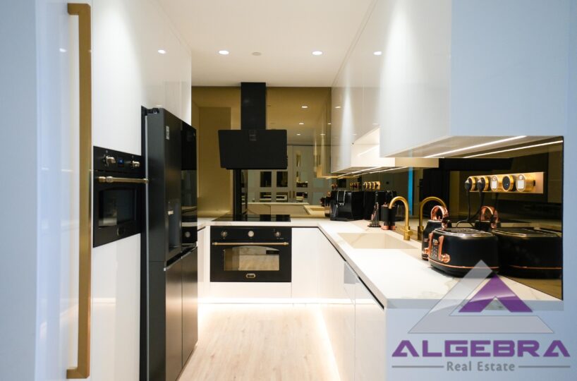 kitchen with algebra real estate logo