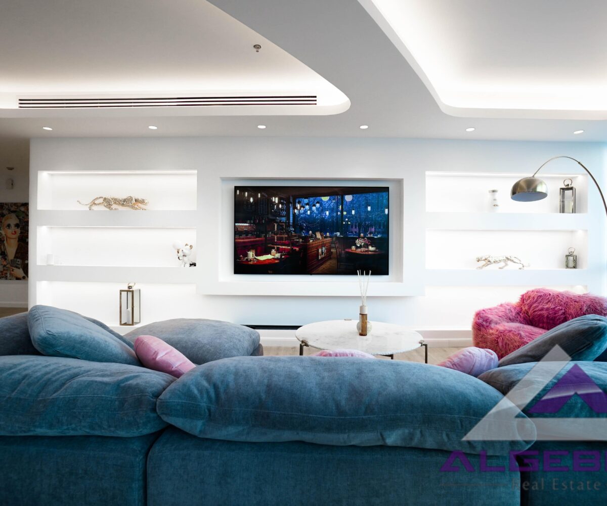livingroom with sofa tv and lights